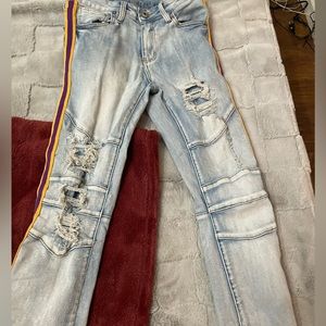 Skinny jeans, stretchy, and ripped, great fitting.